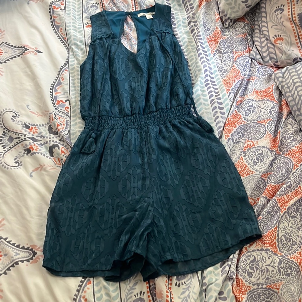 Romper from Francesca‘s size XXS. Miami brand